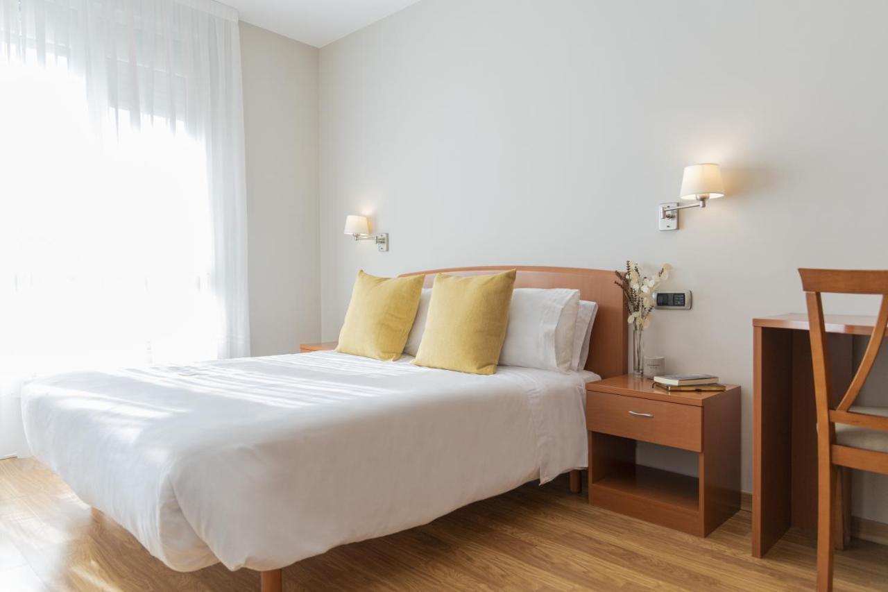 Hostal Alba لوغو المظهر الخارجي الصورة