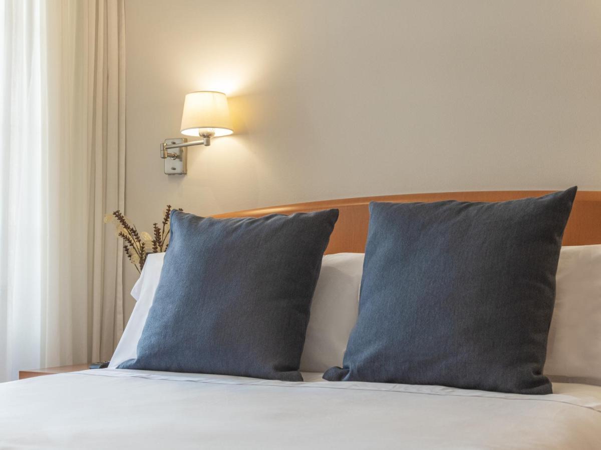 Hostal Alba لوغو المظهر الخارجي الصورة