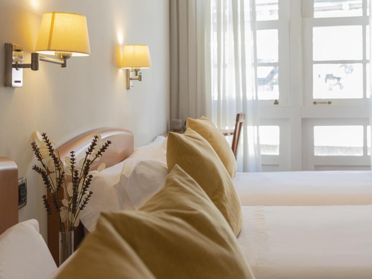 Hostal Alba لوغو المظهر الخارجي الصورة