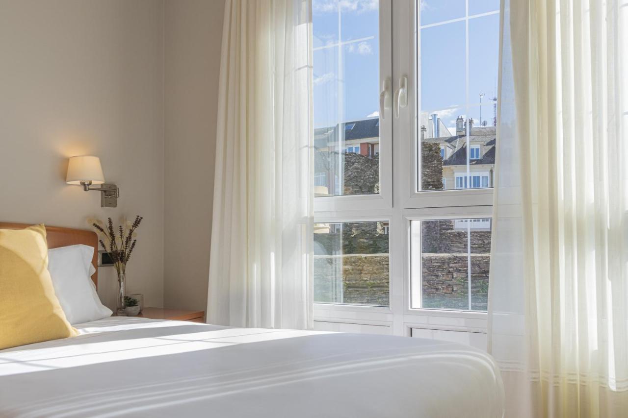 Hostal Alba لوغو المظهر الخارجي الصورة