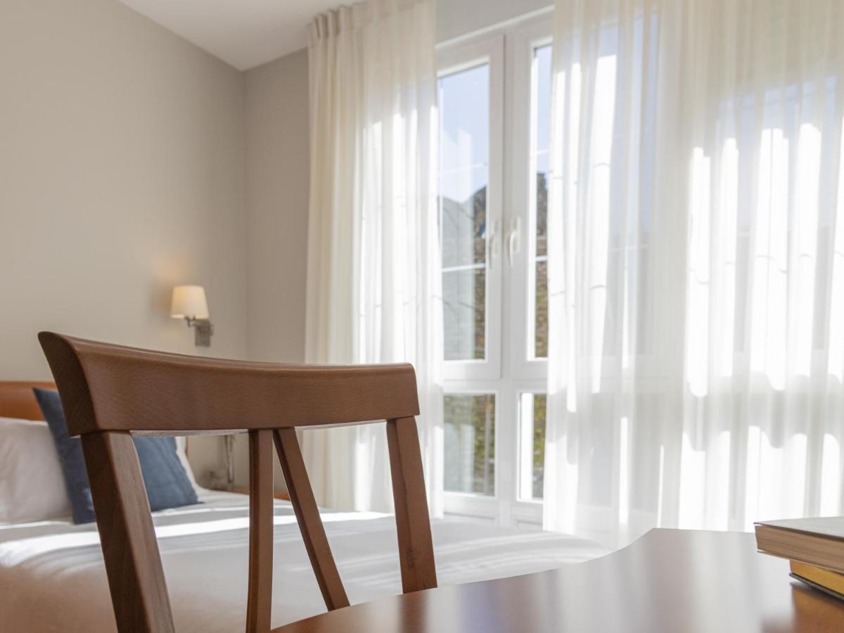 Hostal Alba لوغو المظهر الخارجي الصورة